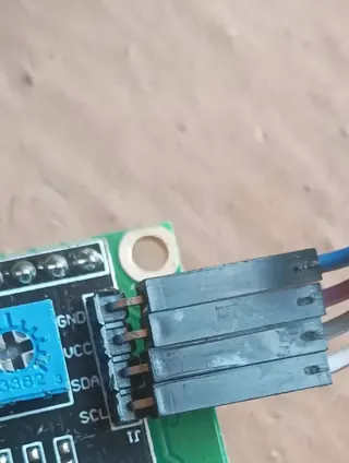 The I2C backpack soldered to the back of the display module