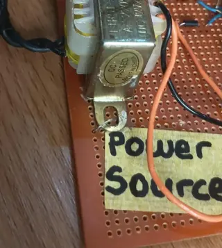 The completed power board, hand-labelled Power Source